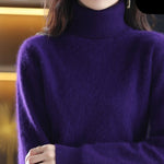 Sweter damski w stylu kaszmiru na wieszaku