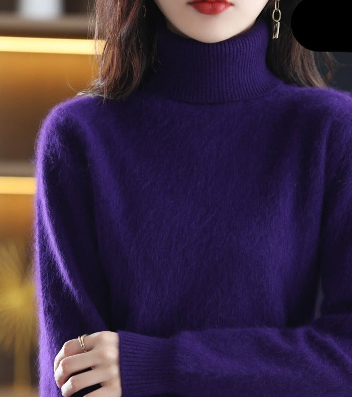 Sweter damski w stylu kaszmiru na wieszaku